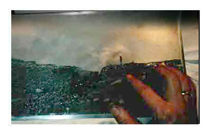 Inking the zink plate.